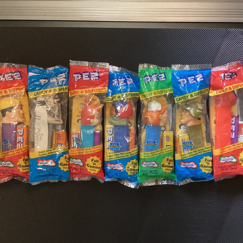 Lot of NEW in Packages 7 PEZ Candy & Dispensers